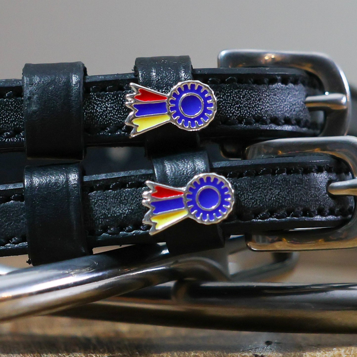 Tri color spur strap